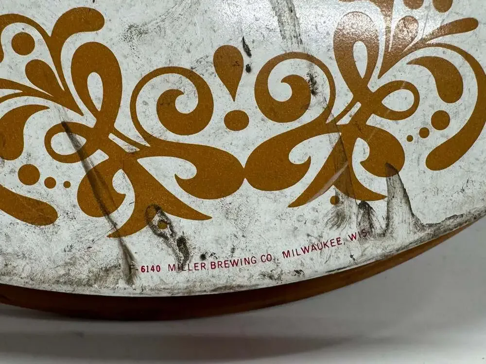 Miller Brewing Co. round metal